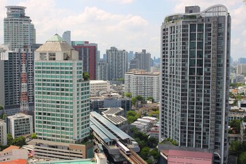 Fototapeta premium High-rise condominiums and urban cityscape around BTS Phra Khanong in Bangkok, Thailand