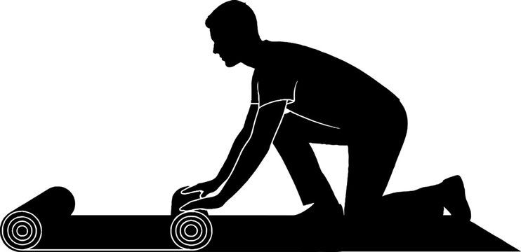 Silhouette of man using foam roller for exercise.