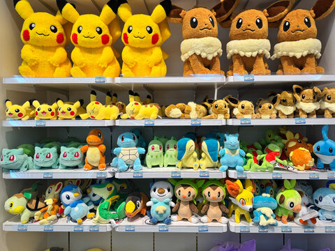 Hiroshima, Japan - April 20, 2026: Assorted Pokemon characters, plush toys dolls displayed for sale at the Pokemon Center