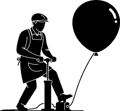 Worker inflating large black balloon with manual pump.