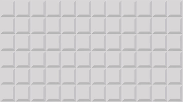 Abstract grey geometric pattern featuring a repetitive layout of raised 3d squares creating a modern textured background surface.