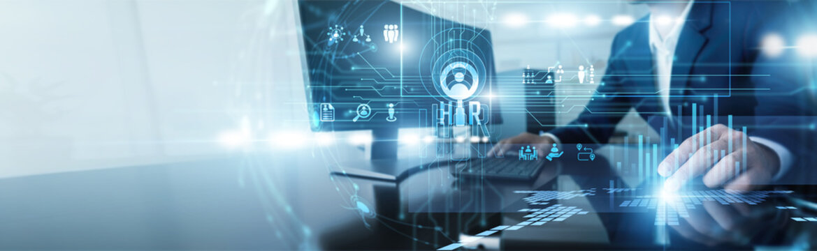 Personnel manager working on computer human resources. Professional handling employee recruitment and talent management to foster a productive workplace culture and staff development.