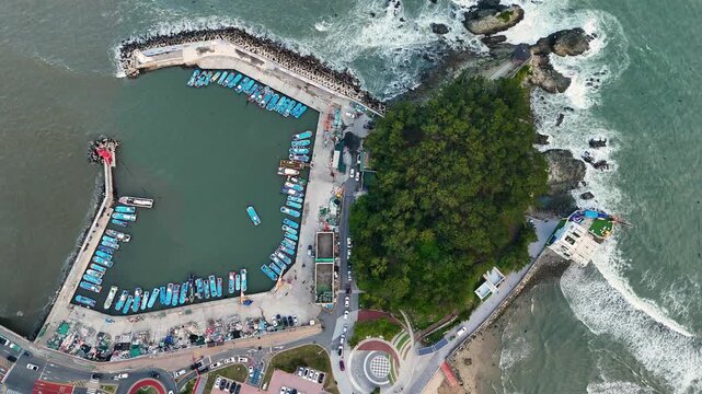 Aerial top down view of songjeong breakwater harbor in busan, south korea