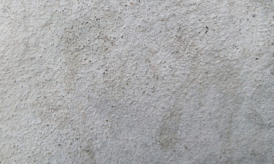 Fototapeta premium Industrial gray concrete wall texture, rough cement surface background, weathered stone plaster finish for architectural design and construction