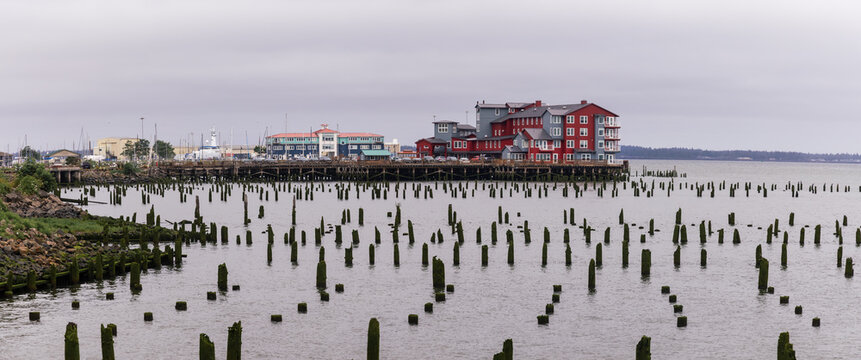 Astoria waterfront with pilings and Columbia River views