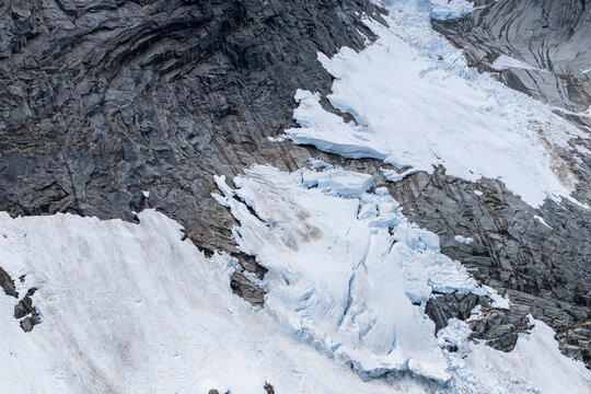 Glacier Ice and Jagged Rock Face on Alpine Mountain in British Columbia, Canada Panorama