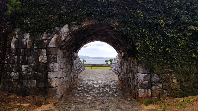 View to the Park and Sea through the Arc in Old Stone Wall