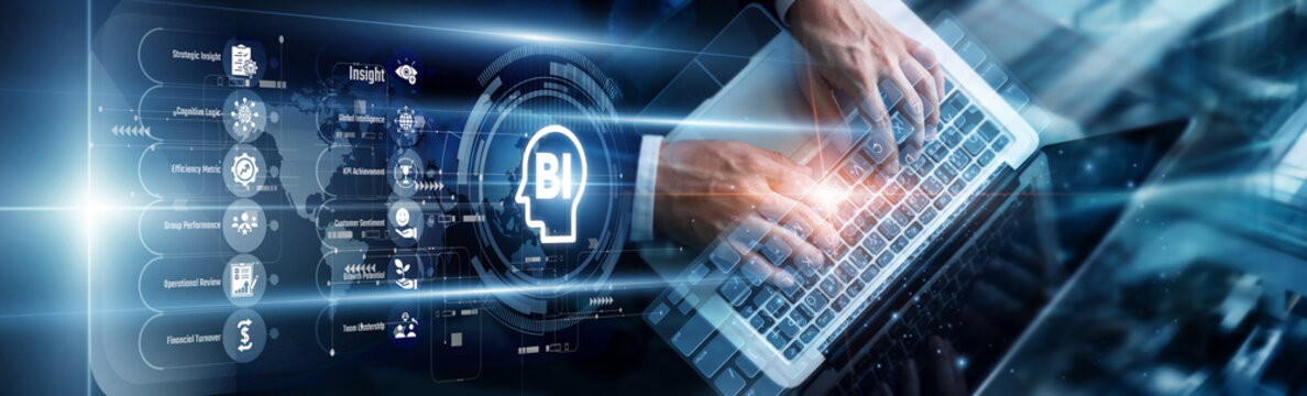 Analyst using a laptop to analyze business intelligence dashboards. This development transforms raw operational data into actionable insights, driving smarter strategic decisions for companies.