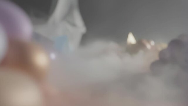 Abstract visualization of cognitive brain fog featuring blurred layers, fading geometric shapes, and soft out-of-focus spheres in a misty gray, white, and purple atmosphere.
