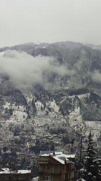 mountain village in the snowfall dron shot manali india