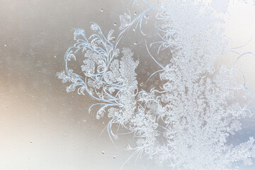 Fototapeta premium Frost pattern on window glass as background