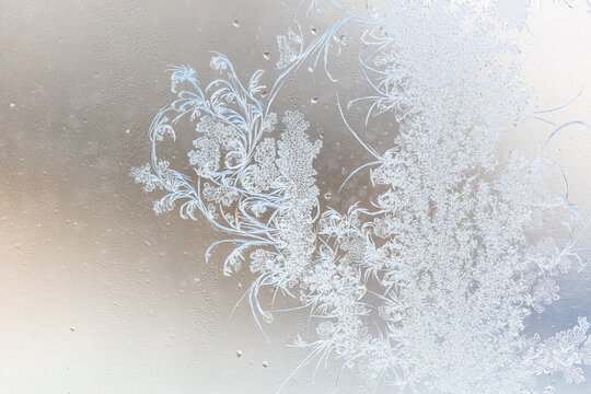 Frost pattern on window glass as background