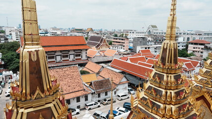 Wide High Overlook Panorama Multiple Golden Gilded Temple Spires Over Bangkok City Residential Area © Two Cats Media
