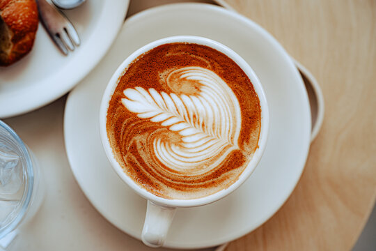 cup of coffee with Latte art in morning.