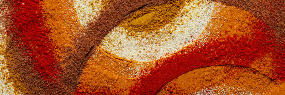 Colorful spice powder composition abstract food texture background