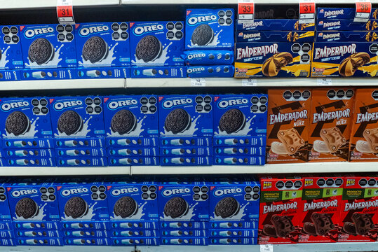 Villa de Alvarez, Colima. Mexico. June 17, 2026: Supermarket Shelf Display with Oreo and Emperador Cookie Packages in Retail Store