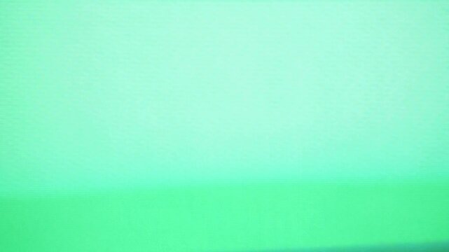 Green tv signal static texture for design projects needing vintage technology aesthetic. Ideal for backgrounds, overlays, and digital media projects.