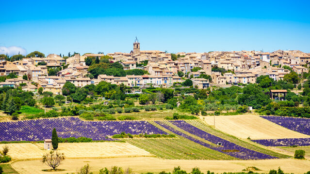 Hilltop Puimoisson village, France. Provence landscape with lavender fields. Plateau Valensole, Alpes de Haute Provence.