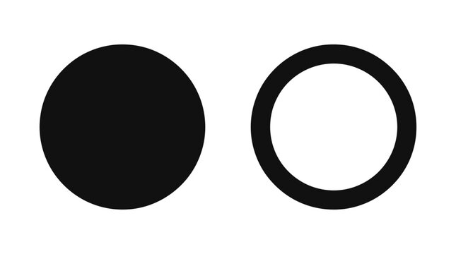 Two Black Circular Shapes Solid And Hollow On White Background