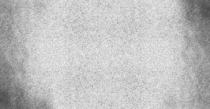 Abstract speckled texture background with grainy effect and vignette