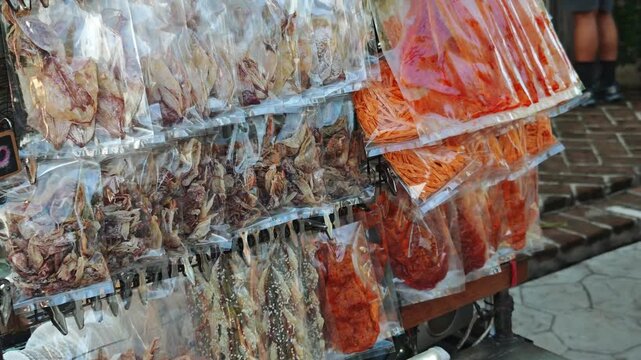 Dried squid with sweet fish sauce in the market.