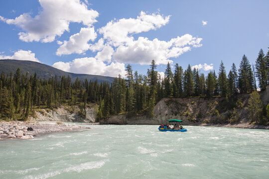 Group enjoys a scenic float trip on a turquoise river