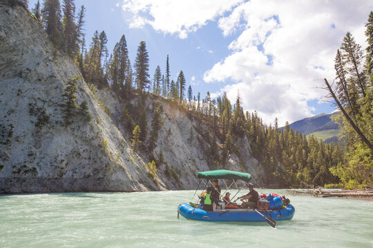 Family on a scenic river rafting expedition trip