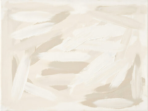 Abstract beige paint strokes on canvas textured surface backdrop