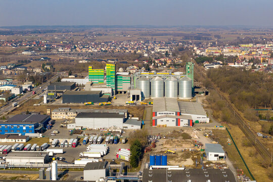 Grajewo, Wojewodztwo podlaskie, Poland - 14 March 2026: Aerial view of the Agrocentrum sp. z o.o. facility with grain silos, industrial buildings, and trucks in the yard.