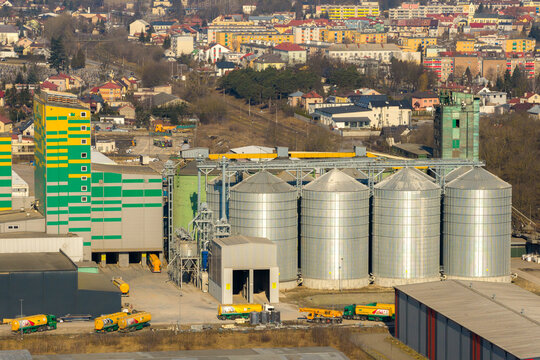 Grajewo, Poland - 14 March 2026: Aerial view of the Agrocentrum sp. z o.o. grain silos and industrial facility with trucks and storage tanks in Grajewo, Wojewodztwo podlaskie, Poland.