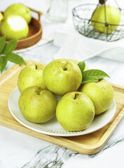 Fresh Jade Pears with Dew Drops on Wooden Board - Shanxi Xixian Produce © CanVan