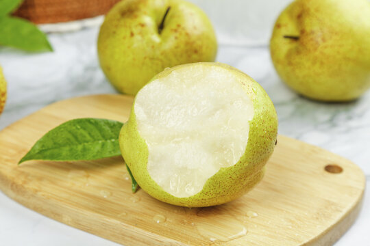 Fresh Yulu Pears Cut in Half on Wooden Board, Xian Shanxi