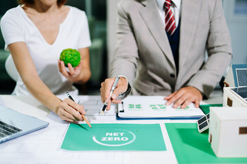 Obraz premium business team people planning and discussing on recycle reduce reuse policy symbol in office meeting room. Green business company and Solar Energy Environment city Concept.