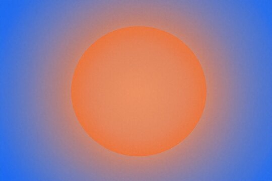 A blurry image of a blue and orange background