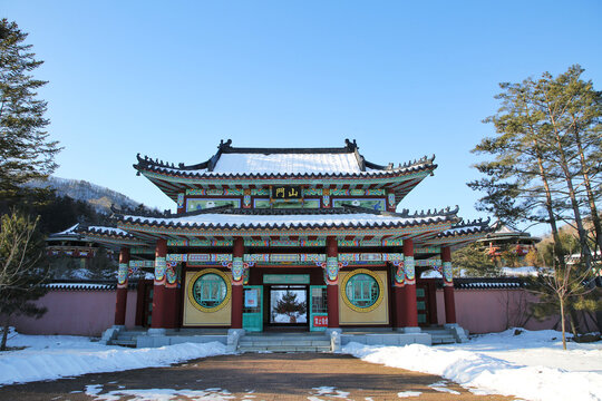 Huayan Temple Gate in Jilin, China - Traditional Asian Architecture in Winter