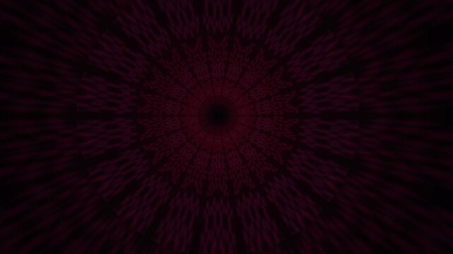 Red radial kaleidoscopic light burst on dark background.