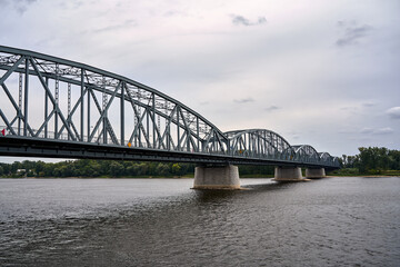 Fototapeta premium Steel road bridge structure over the Vistula River in Torun