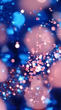 A Captivating Display of Colorful Bokeh Lights with Sparkling Blue and Pink Hues, Creating a Dreamlike and Ethereal Ambiance in a Visual Symphony of Glittering Dots.