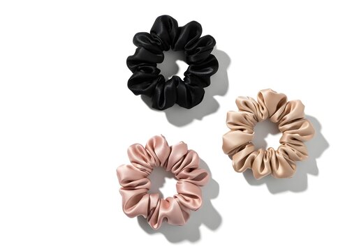 Satin hair scrunchie set isolated on white background.