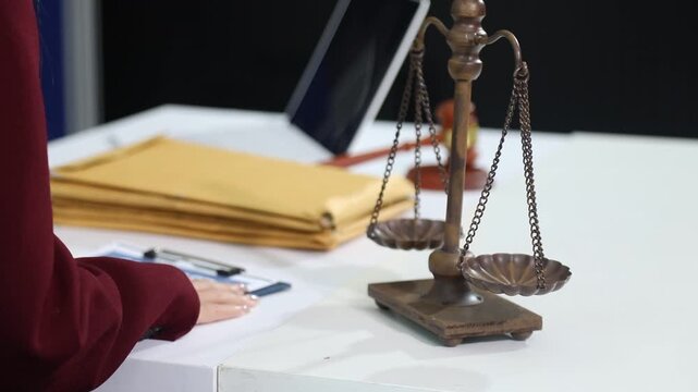 Close up of businessmen or lawyers discussing contract or business agreement at law firm office, Business people making deal document legal, justice advice service concept.