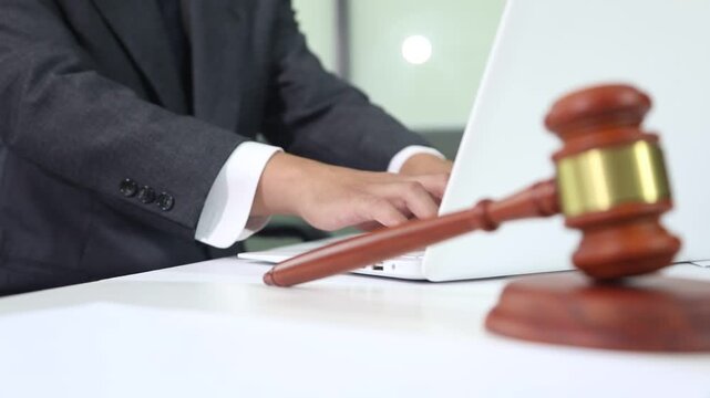 Close up of businessmen or lawyers discussing contract or business agreement at law firm office, Business people making deal document legal, justice advice service concept.