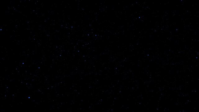 Particules rondes et bleues sur fond noir, avec effet de mouvement frontal zoom&eacute;