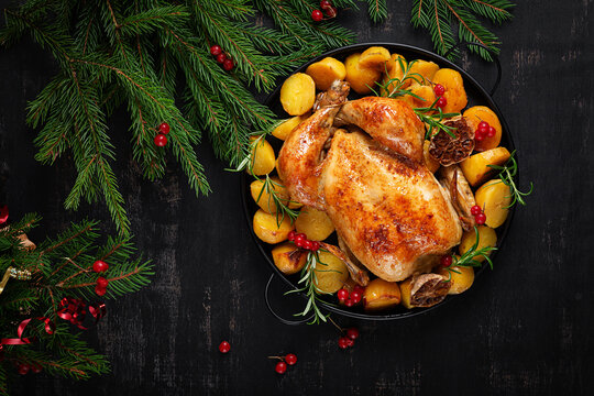Holiday Comfort Food with Whole Roasted Chicken and Vegetables. Top view