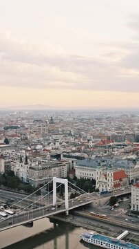 Budapest cityscape aerial view bridge Danube river sunset Hungary drone vertical reel background