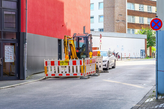 Iserlohn Germany June 20 2026 Komatsu excavator at road construction site in urban street
