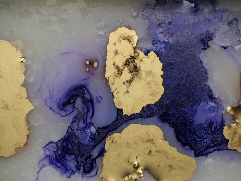 Alcohol ink composition. Fluid abstract ink patterns with gold highlights create a luxurious marble-like surface. Suitable for elegant branding, wall art, and modern creative projects. Can be used as 
