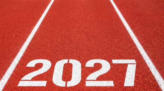 Year 2027 printed on a red running track with white lines representing goals and future.