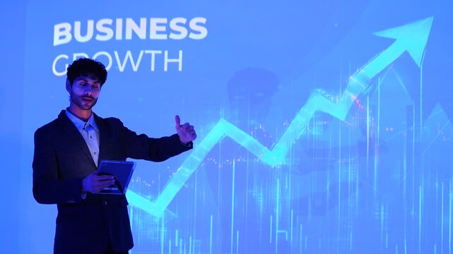 A male investment analyst presents the company's growth plan, including stock charts and computer-generated analysis of management systems, business intelligence, data statistics 