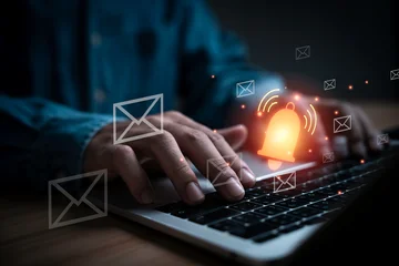 Fototapeten Musik Email notification and alert concept on laptop computer with glowing bell icon and message symbols. Digital communication, inbox management, email marketing, business alerts and online messaging.  © Dilok