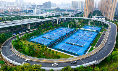 Tennis Courts Under Bridge in Wuhan Urban Development © DoMinh